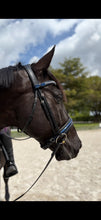 Load image into Gallery viewer, Bridleberry #57 EXTRA PADDED SNAFFLE BRIDLE, BLUE PATENT LEATHER NOSEBAND &amp; CRYSTAL BROWBAND W/ ENGLISH LEATHER RUBBER LINED REINS
